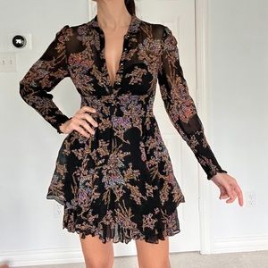 Free People long sleeve mini dress with fall/winter flower print.